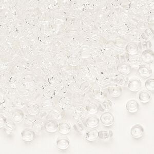 Seed bead, Dyna-Mites&trade;, glass, transparent clear, #6 round. Sold per 1/2 kilogram pkg.