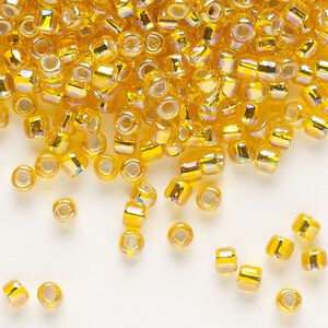 Seed bead, Dyna-Mites&trade;, glass, silver-lined translucent rainbow orange, #6 round with square hole. Sold per 40-gram pkg.
