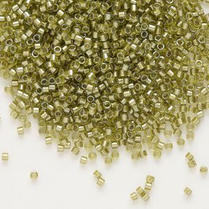 Seed bead, Delica&reg;, glass, pkg/50g, #11 round, translucent beige-lined luster chartreuse (DB-0908).