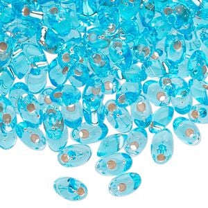 Seed bead, Miyuki, glass, pkg/250g, 7x4mm long magatama, transparent silver-lined light blue (LMA-18).