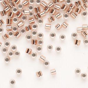 Seed bead, Delica&reg;, glass, pkg/50g, #8 round, transparent copper-lined crystal clear (DBL-0037).