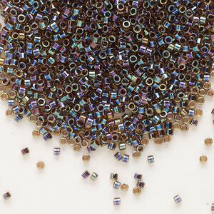 Seed bead, Delica&reg;, glass, pkg/50g, #11 round, translucent root beer-lined rainbow light topaz (DB-0087).