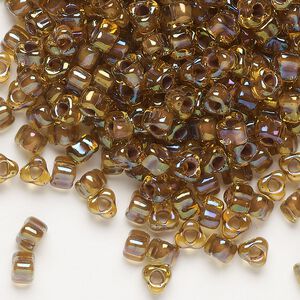 Seed bead, Miyuki, glass, transparent dark amber yellow color-lined purple, (TR1162), #5 triangle. Sold per 250-gram pkg.