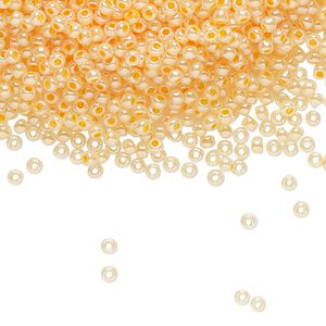 Seed bead, TOHO BEADS&reg;, glass, pkg/50g, #11 round, opaque ceylon apricot (TR-11-904).