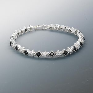 Bracelet, black onyx (dyed) / cubic zirconia / sterling silver, 4x4mm faceted square and star with 2mm faceted round, 7-1/2 inches with lobster claw clasp. Sold individually.