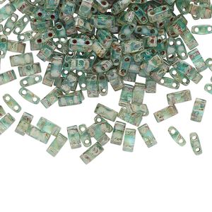 Seed bead, TILA&reg;, glass, pkg/250g, 5x2.3mm half tila rectangle, translucent Picasso turquoise blue, (HTL-4506).