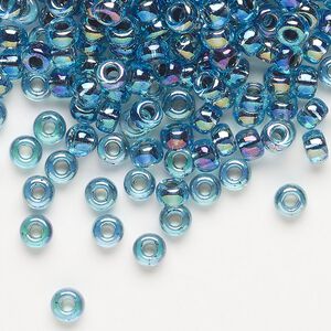 Seed bead, Miyuki, glass, pkg/25g, #6 rocaille, translucent blue-lined rainbow aqua (RR-339).