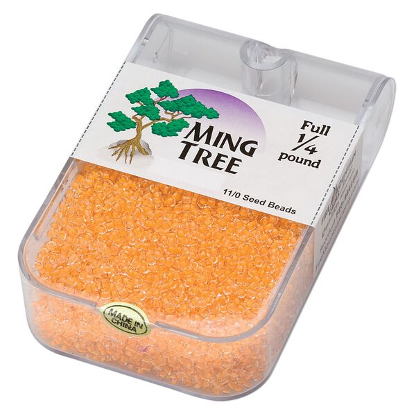 Seed bead, Ming Tree&trade;, glass, pkg/1/4 pound, #11 round, transparent color-lined light orange. image number 0