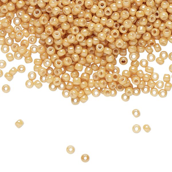 Seed bead, TOHO BEADS&reg;, glass, pkg/7.5g, #11 round, opaque luster dark beige (TR-11-123D). image number 0