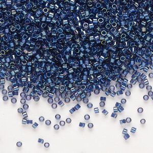 Seed bead, Delica&reg;, glass, pkg/50g, #11 round, translucent night sky-lined luster crystal clear (DB-2386).