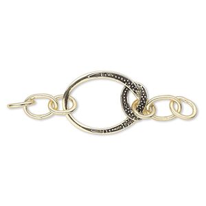 Focal, antique gold-finished bronze, 69x20mm single-sided with 28x20mm oval knot. Sold individually.