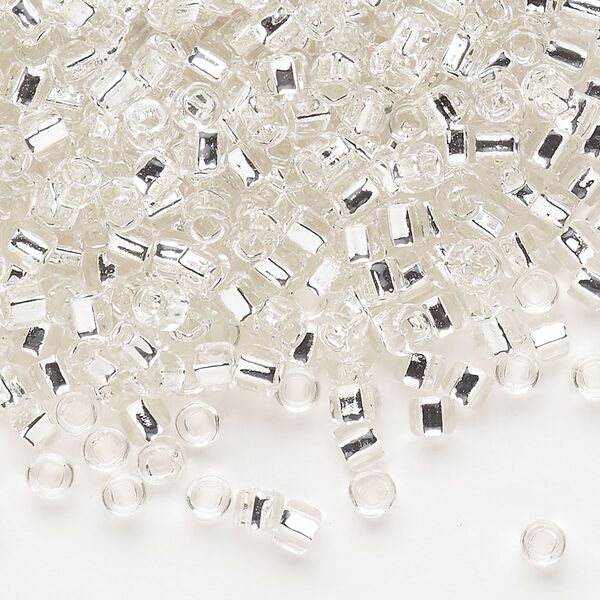 Seed bead, Dyna-Mites&trade;, glass, silver-lined translucent clear, #6 round with square hole. Sold per 1/2 kilogram pkg. image number 0