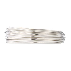 Wire, fine silver, dead-soft, round, 22 gauge. Sold per 25-foot spool.
