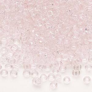Seed bead, Dyna-Mites&trade;, glass, transparent light pink, #6 round. Sold per 1/2 kilogram pkg.