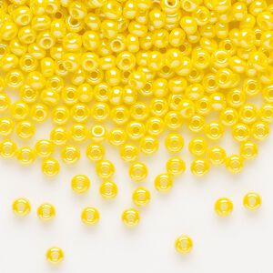 Seed bead, Preciosa Ornela, glass, opaque luster yellow, #8 rocaille. Sold per 50-gram pkg.