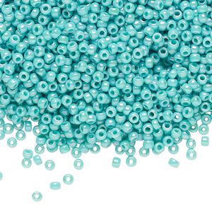 Seed bead, TOHO BEADS&reg;, glass, pkg/50g, #11 round, opaque rainbow turquoise blue (TR-11-413).