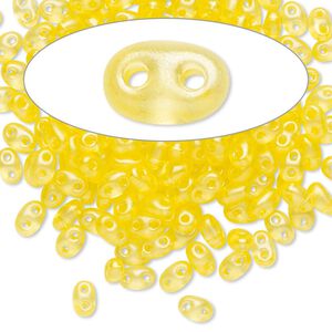 Seed bead, Preciosa Twin&trade; Czech glass, pkg/10g, 5x2.5mm oval, translucent yellow terra pearl clear, (08386).