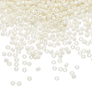 Seed bead, TOHO BEADS&reg;, glass, pkg/50g, #11 round, opaque luster Navajo white (TR-11-122).