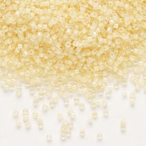 Seed bead, Delica&reg;, glass, pkg/7.5g, #11 round, translucent ivory-lined luster crystal clear (DB-2371).