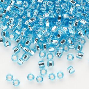 Seed bead, Dyna-Mites&trade;, glass, silver-lined translucent light aqua, #6 round with square hole. Sold per 1/2 kilogram pkg.