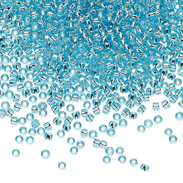 Seed bead, TOHO BEADS&reg;, glass, pkg/7.5g, #11 round, transparent silver-lined aquamarine (TR-11-23). image number 0