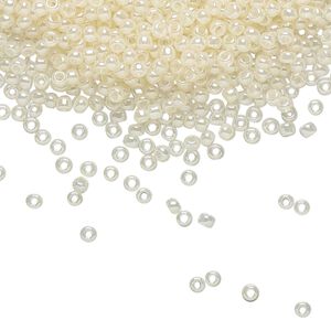 Seed bead, TOHO BEADS&reg;, glass, pkg/7.5g, #11 round, translucent ceylon light ivory (TR-11-147).