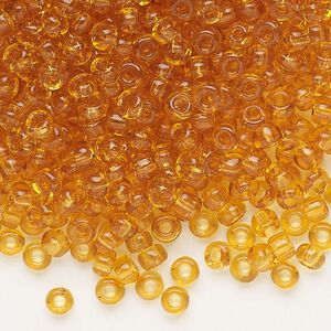 Seed bead, Dyna-Mites&trade;, glass, transparent amber yellow, #6 round. Sold per 40-gram pkg.