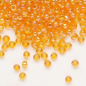 Seed bead, Dyna-Mites&trade;, glass, transparent rainbow orange, #6 round. Sold per 1/2 kilogram pkg.