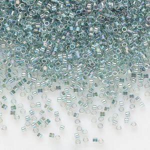 Seed bead, Delica&reg;, glass, pkg/7.5g, #11 round, translucent seafoam-lined rainbow crystal clear (DB-0084).