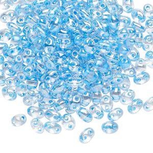 Seed bead, Preciosa Twin&trade; Czech glass, pkg/250g, 5x2.5mm oval, transparent sky blue terra color-lined clear, (38665).