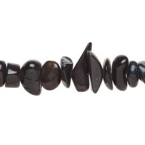 Bead, bamboo coral (dyed), black, medium chip, Mohs hardness 3-1/2 to 4. Sold per 15-1/2" to 16" strand.