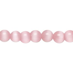 Bead, cat's eye glass (fiber optic glass), opaque light pink, 7mm round. Sold per 15-1/2" to 16" strand.