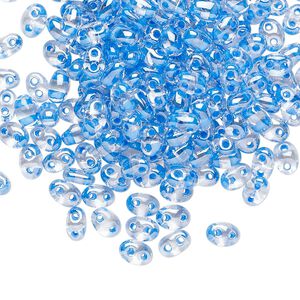 Seed bead, Preciosa Twin&trade; Czech glass, pkg/10g, 5x2.5mm oval, transparent sea blue terra color-lined clear, (38636).