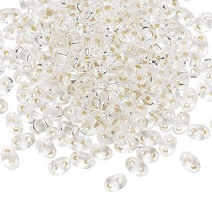 Seed bead, Preciosa Twin&trade; Czech glass, pkg/250g, 5x2.5mm oval, transparent silver-lined clear, (78102).