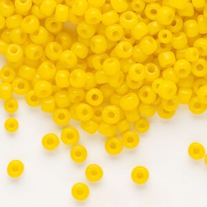 Seed bead, Dyna-Mites&trade;, glass, opaque dark yellow, #6 round. Sold per 1/2 kilogram pkg.