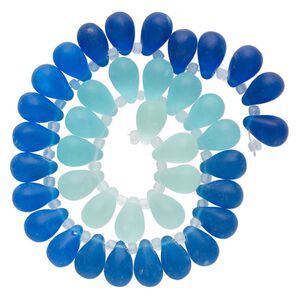 Bead, glass, translucent matte pale blue, blue and royal blue, 16x10mm top-drilled teardrop with irregular rondelles. Sold per 14-inch strand.