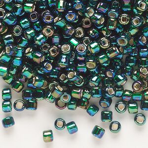 Seed bead, Dyna-Mites&trade;, glass, silver-lined translucent rainbow dark green, #6 round with square hole. Sold per 40-gram pkg.