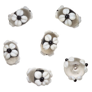 Bead, lampworked glass 1pkg6, clear / opaque white / black, 18x11mm rondelle with flowers.