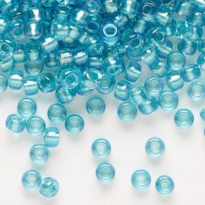 Seed bead, Miyuki, glass, pkg/25g, #6 rocaille, translucent aqua-lined luster crystal clear (RR-1822).