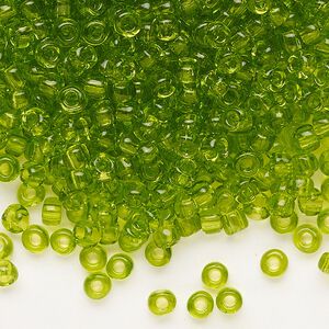 Seed bead, Dyna-Mites&trade;, glass, transparent light green, #6 round. Sold per 1/2 kilogram pkg.