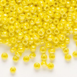 Seed bead, Dyna-Mites&trade;, glass, opaque rainbow yellow, #6 round. Sold per 40-gram pkg.