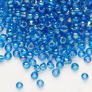 Seed bead, Dyna-Mites&trade;, glass, transparent rainbow teal, #6 round. Sold per 40-gram pkg.
