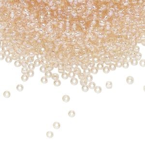 Seed bead, TOHO BEADS&reg;, glass, pkg/7.5g, #11 round, translucent rainbow rosaline (TR-11-169).