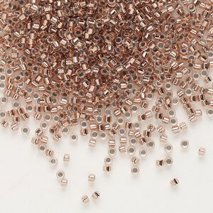 Seed bead, Delica&reg;, glass, pkg/7.5g, #11 round, transparent copper-lined crystal clear (DB-0037).