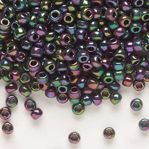 Seed bead, Dyna-Mites&trade;, glass, opaque iris multi-rainbow, #6 round. Sold per 1/2 kilogram pkg.