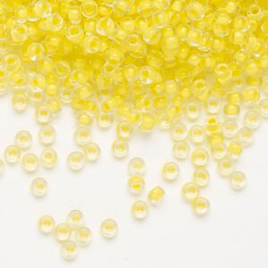Seed bead, Preciosa Ornela Czech glass, pkg/50g, #8 rocaille, transparent terra intensive yellow-lined clear, (08A86).