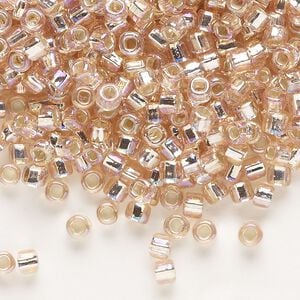 Seed bead, Dyna-Mites&trade;, glass, silver-lined translucent rainbow light pink, #6 round with square hole. Sold per 1/2 kilogram pkg.
