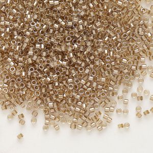 Seed bead, Delica&reg;, glass, pkg/50g, #11 round, translucent beige-lined luster crystal clear (DB-0907).