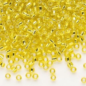 Seed bead, Dyna-Mites&trade;, glass, silver-lined translucent yellow, #8 round. Sold per 1/2 kilogram pkg.