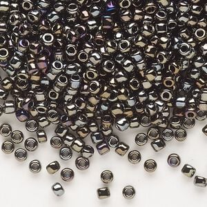 Seed bead, Dyna-Mites&trade;, glass, opaque iris gold, #8 round. Sold per 1/2 kilogram pkg.